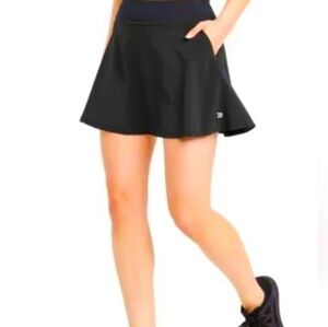 Short, skirt with shorts underneath.